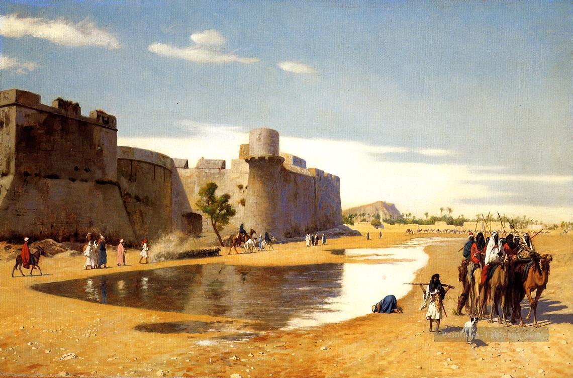 Une caravane d’Arabe à l’extérieur d’une ville fortifiée Égypte Orientalisme grec oriental Jean Léon Gérôme Peintures à l'huile